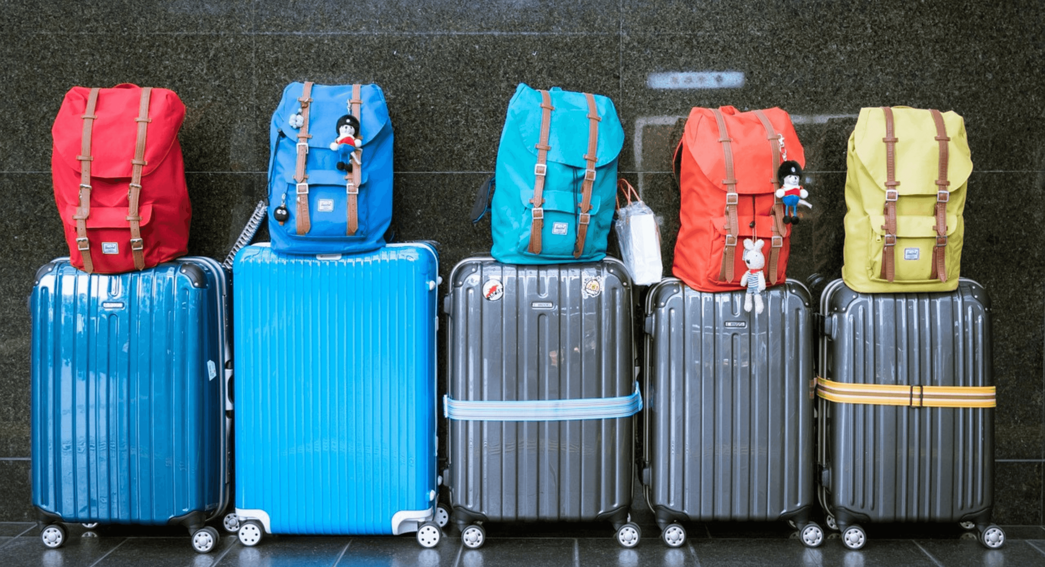 Header nieuwsbericht koffers met tassen.png